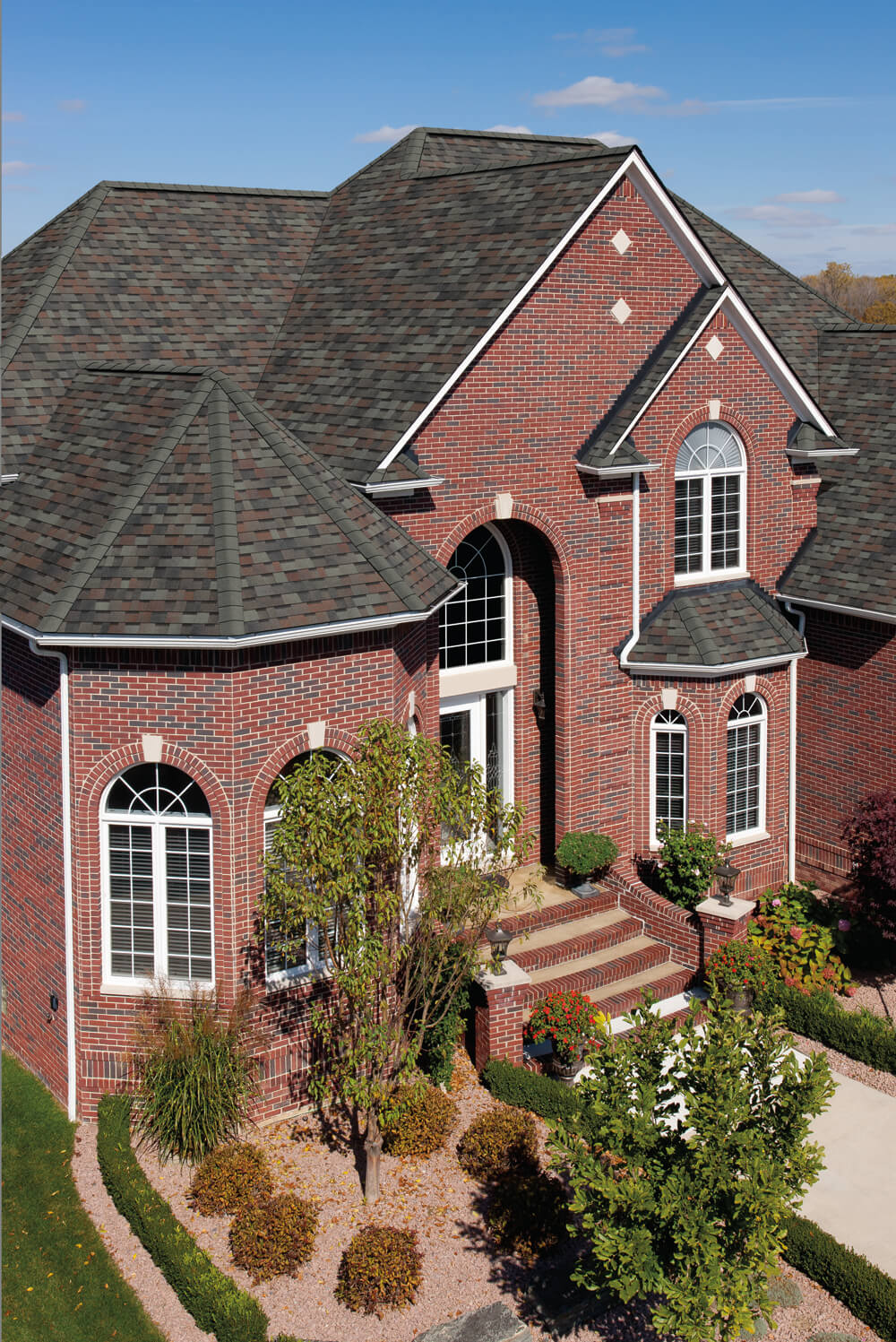 Owens Corning TruDefinition Duration Shingles in Colonial Slate installed on a brick home in Montgomery County, PA.